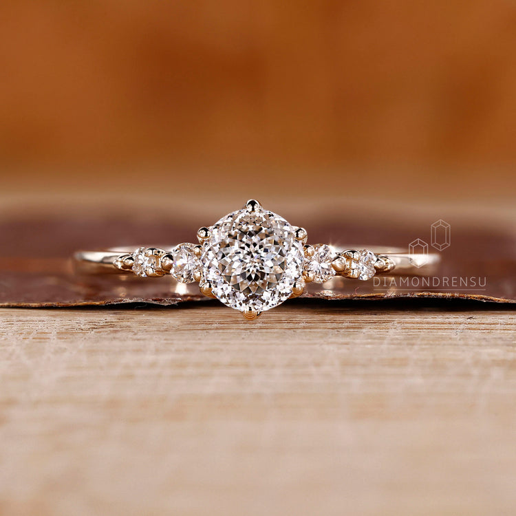 Portuguese cut diamond ring five stone tapered shank.
