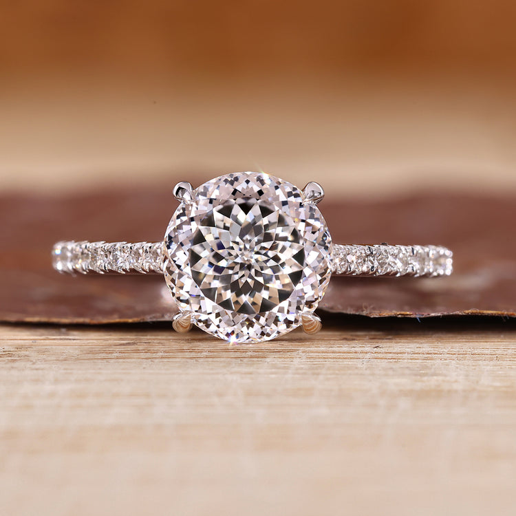 Portuguese cut diamond ring pave round cathedral set.
