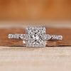 Princess cut diamond ring pear side stones.
