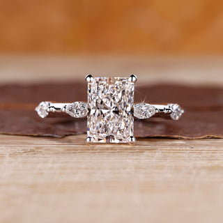 Distance pave hidden halo radiant cut diamond ring.