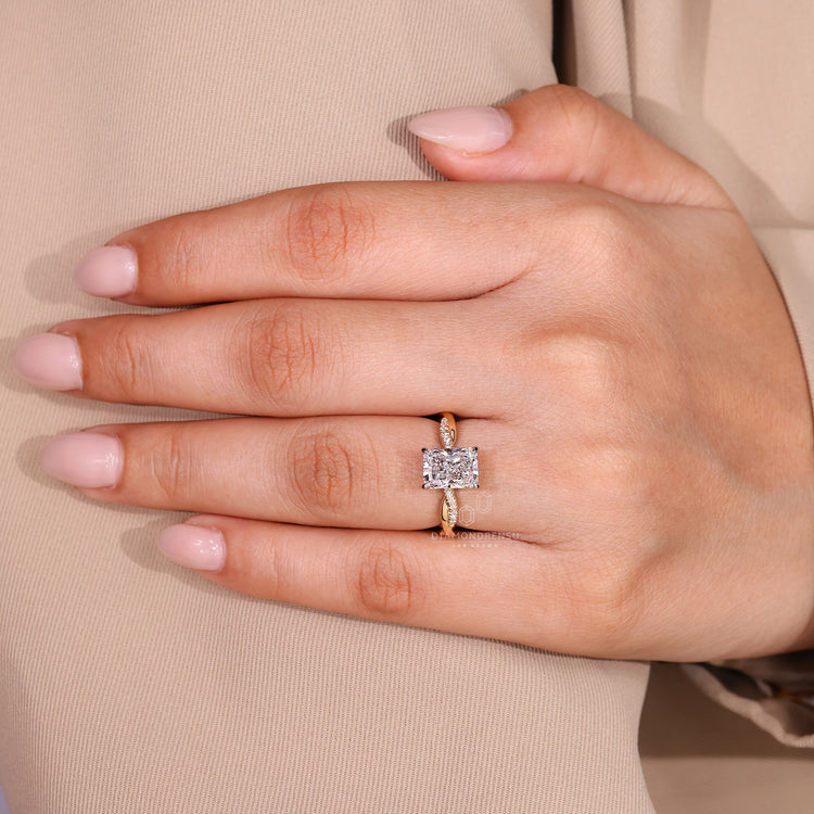 Lab grown diamond radiant cut ring with pave detail.
