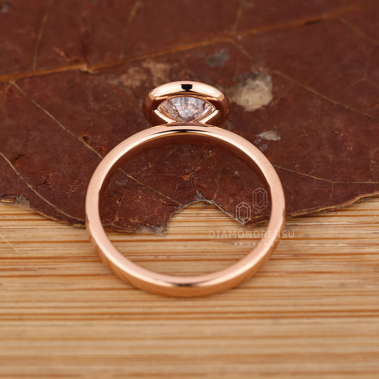 IGI certified round diamond ring four prong setting.
