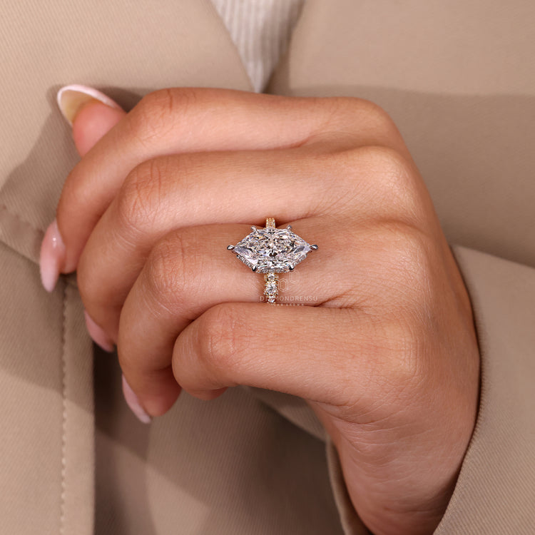 Dutch marquise ring six claw prong hidden halo pave.
