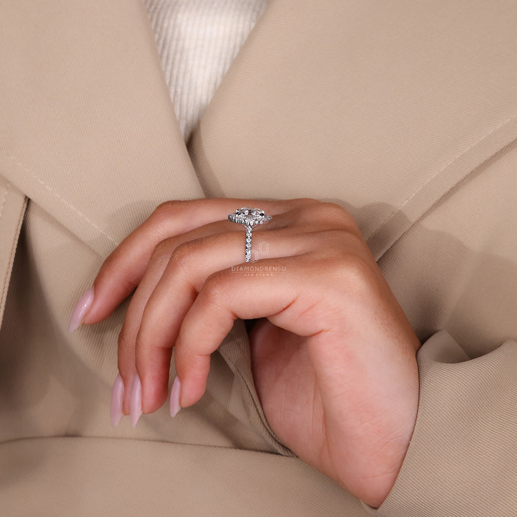 Cushion Old European Cut Ring with pave diamonds.
