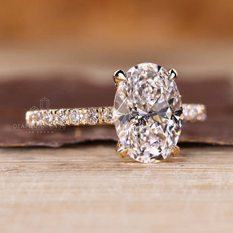 Lab grown oval diamond ring pave hidden halo style.

