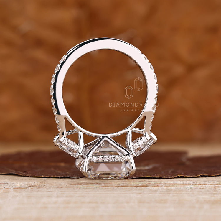 Emerald Cut Diamond Ring elegant hidden halo style.
