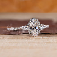 IGI certified oval cut diamond ring with halo setting.
