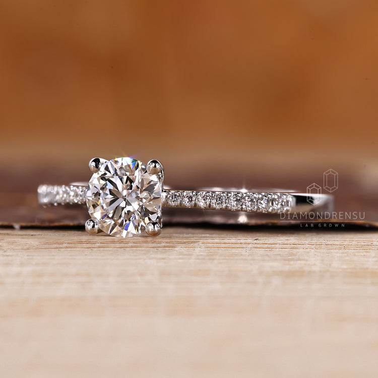 Lab grown round diamond ring pave tapered shank.
