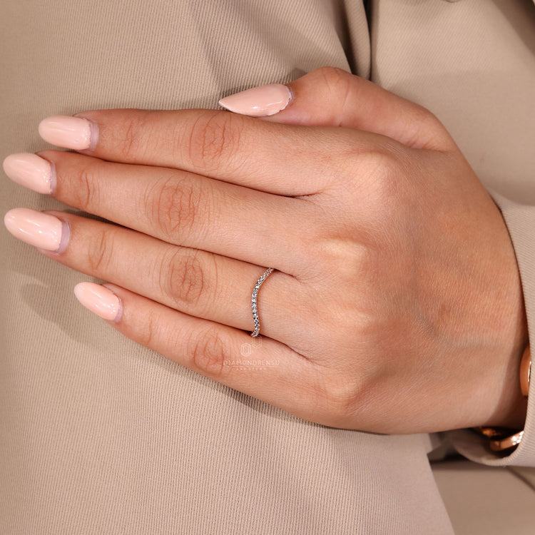 Round cut diamond band handmade ocean wave design.
