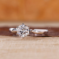 Lab grown round diamond ring pinched shank style.
