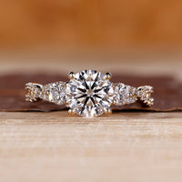 Round cut diamond ring three stone twisted shank vintage.
