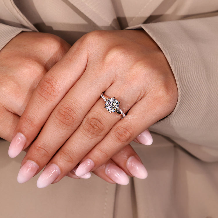 Round cut diamond ring IGI certified twisted pave.