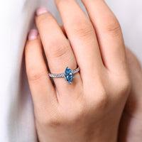 Lab grown marquise diamond ring in cathedral setting.

