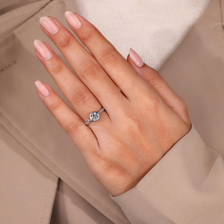 Lab grown diamond bezel ring with pave detail.
