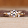 Round Old European Cut Ring with round side stones.
