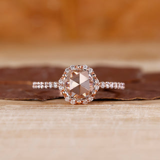 Round rose cut ring with round diamond halo and pave style.
