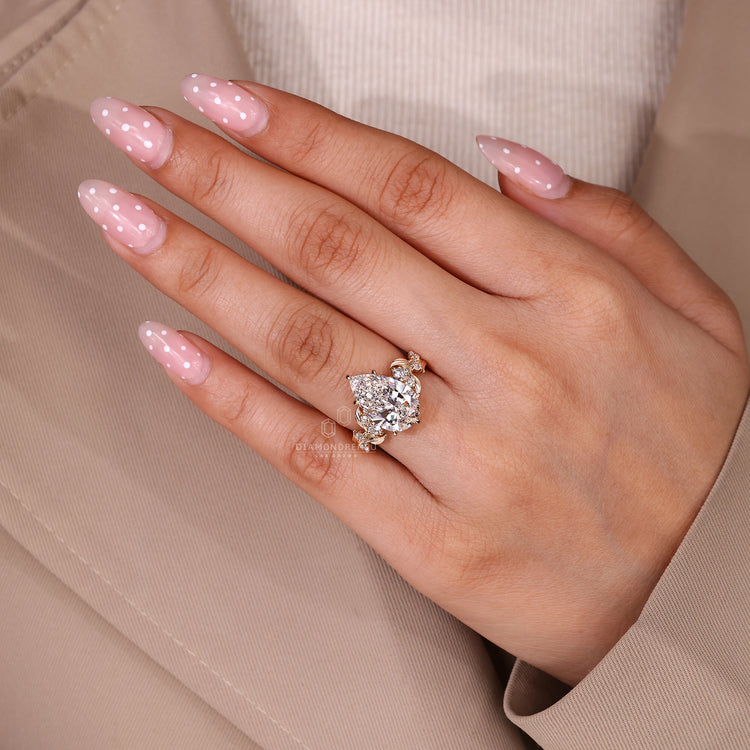 Lab Grown Pear Cut Diamond Ring six claw setting.
