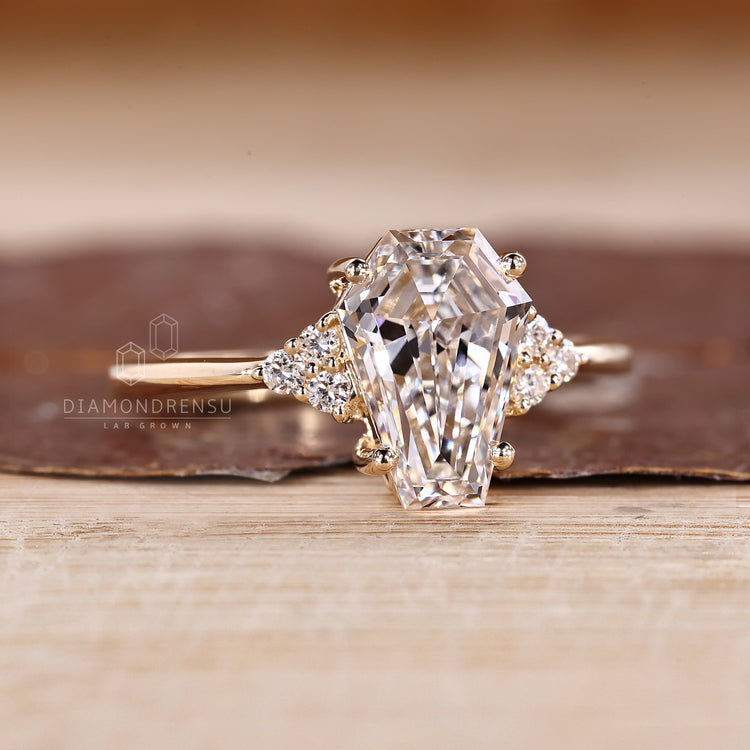 Muse style coffin diamond ring side stones set.