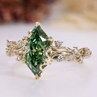 Dutch marquise diamond ring with round side stones.