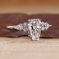 A Muse Style Coffin Diamond Ring with a Slender Design.