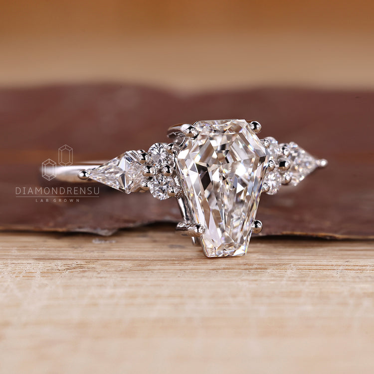 A Muse Style Coffin Diamond Ring with a Slender Design.