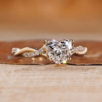 Heart diamond ring with twisted pave design.