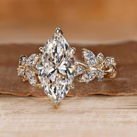 Marquise diamond ring with nature inspired details.