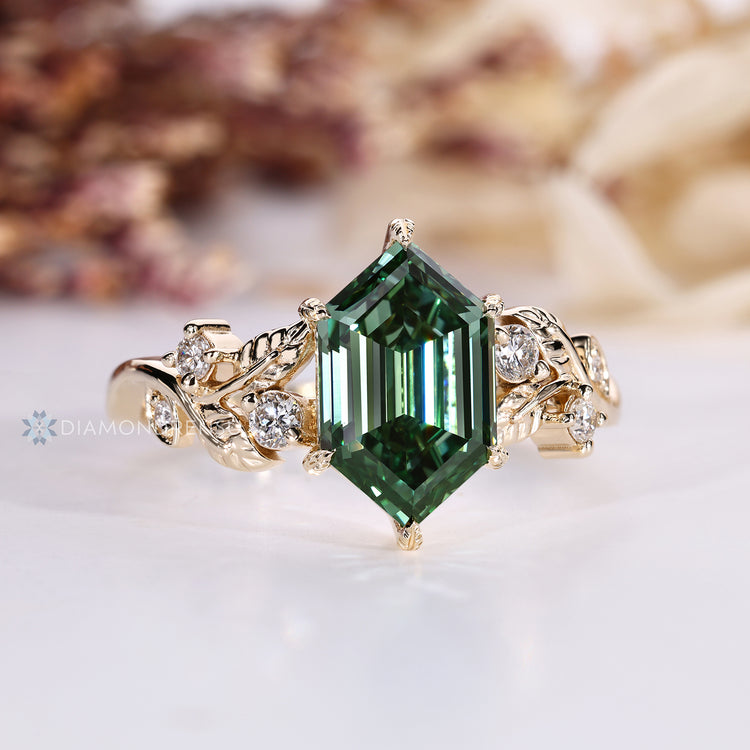 Hexagon diamond ring with six claw prong setting.