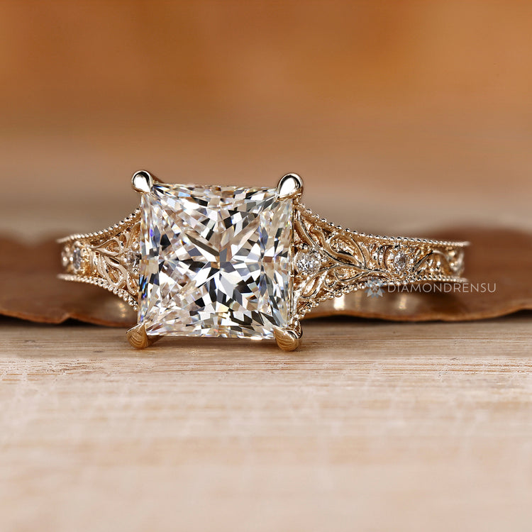 Princess cut ring with vintage Art Deco design.