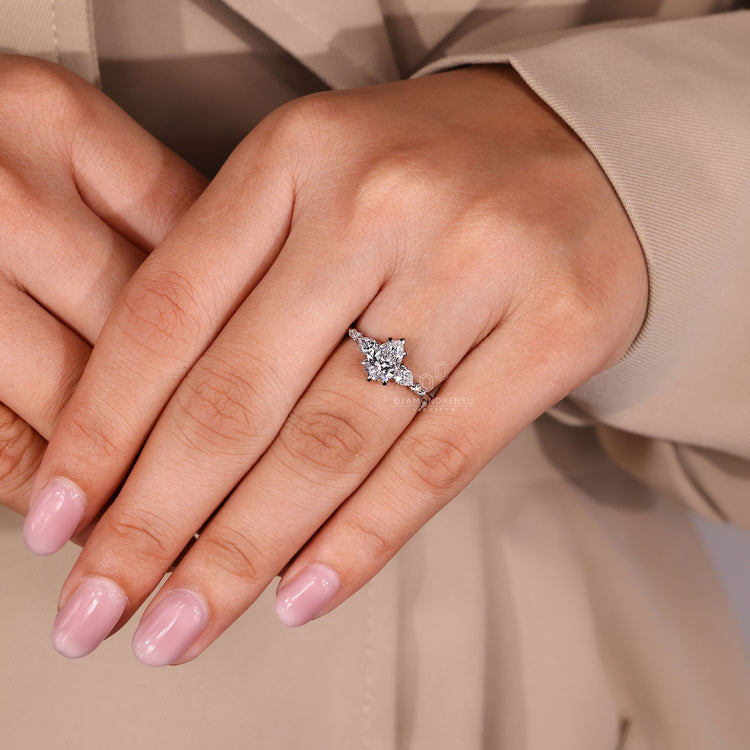 Pear cut diamond ring five claw prong v prong set.
