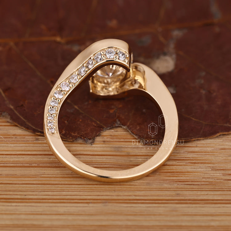 Oval diamond ring handmade hidden pave design.
