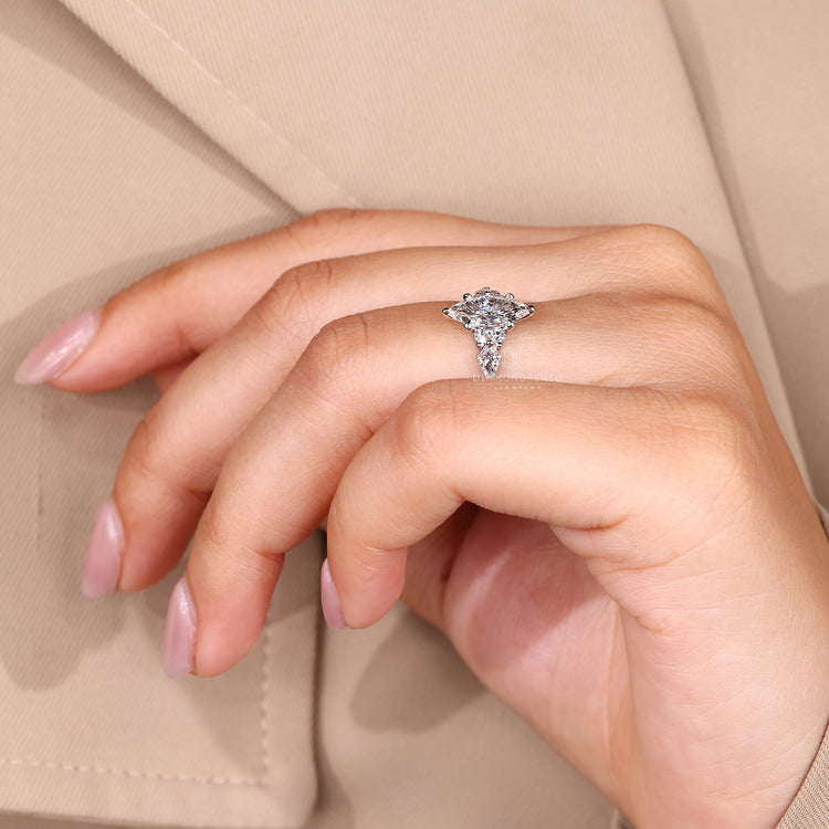 Marquise diamond ring tapered shank prong setting.
