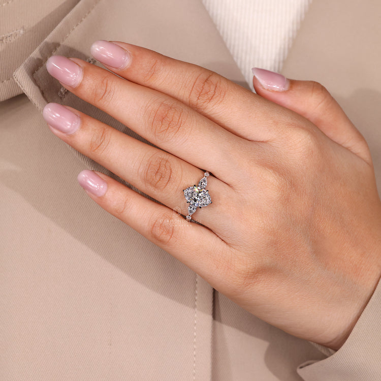 Lab grown diamond oval cut ring with mixed side stones.
