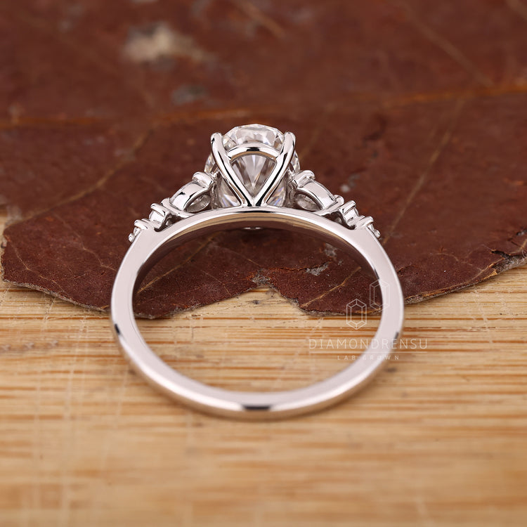 IGI certified oval diamond ring seven stone style.
