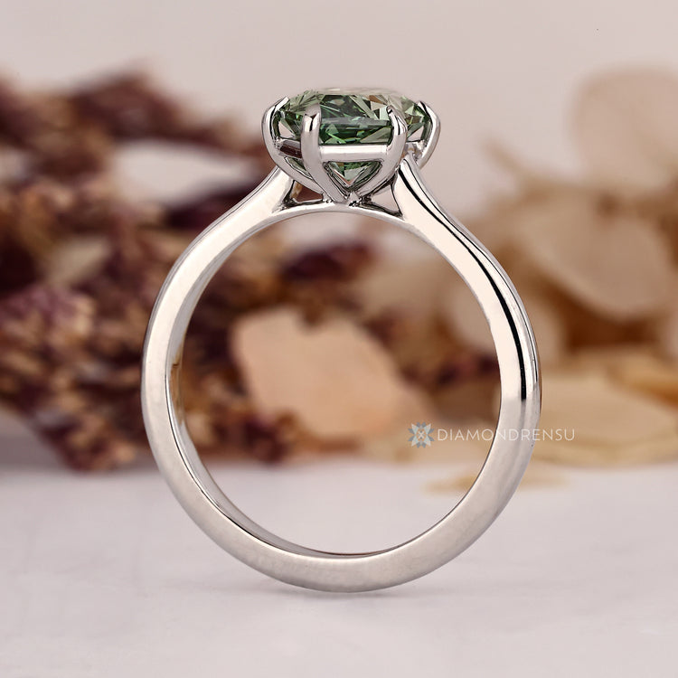 Dutch marquise ring solitaire cathedral setting.
