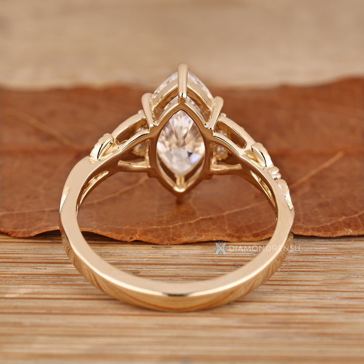 Handmade marquise cut diamond ring nature style.