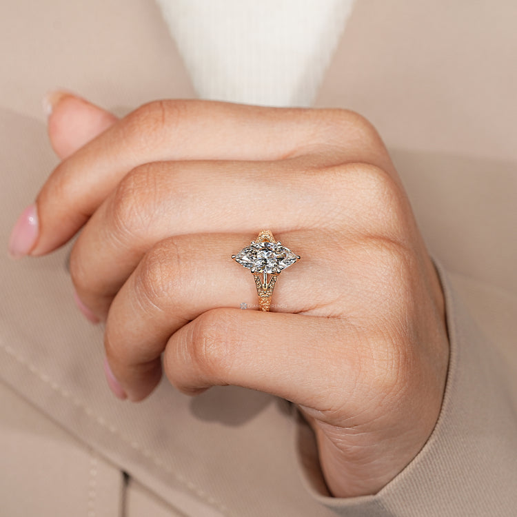 Solitaire marquise diamond ring vintage design.