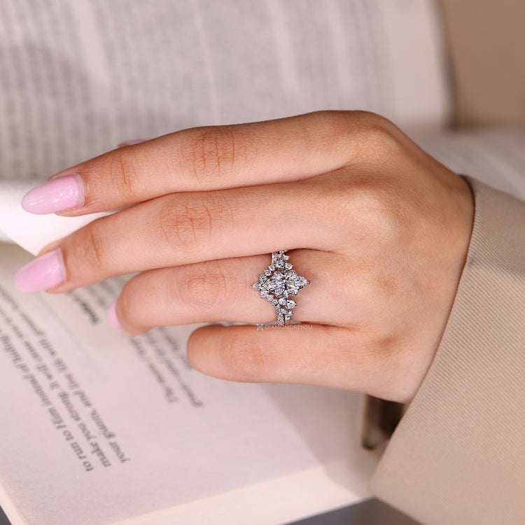 Marquise diamond ring with six claw prong setting.
