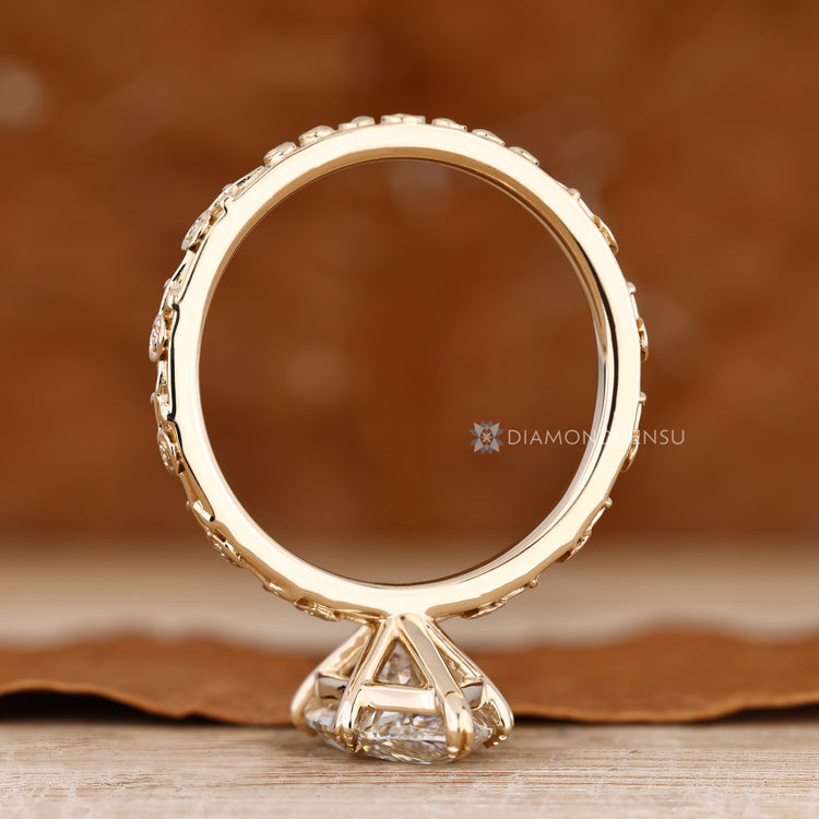 Art Deco marquise diamond ring with leaf prong setting.