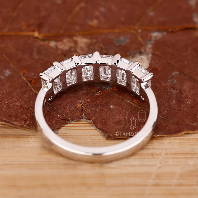 Emerald cut diamond band six stone half eternity set.
