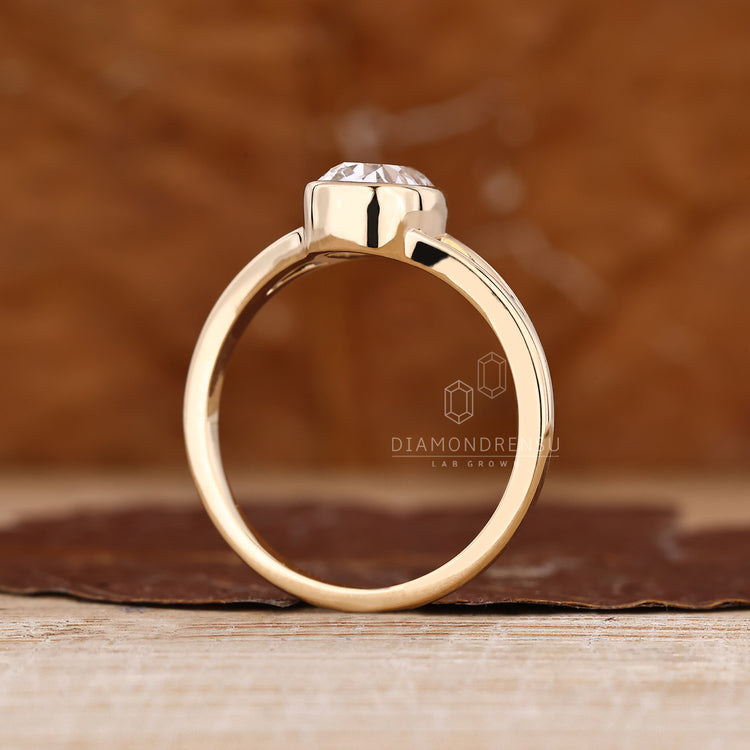 Cushion Old Mine Cut Ring classic bezel design.
