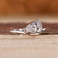 IGI certified pear diamond ring in east to west style.
