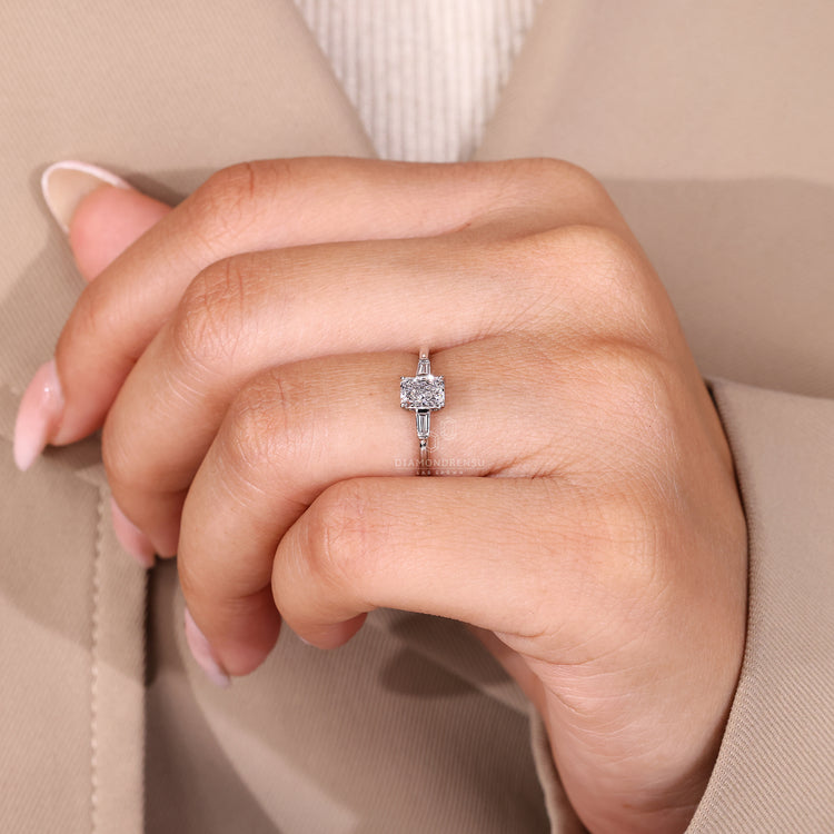 Radiant cut diamond ring cathedral four prong setting.
