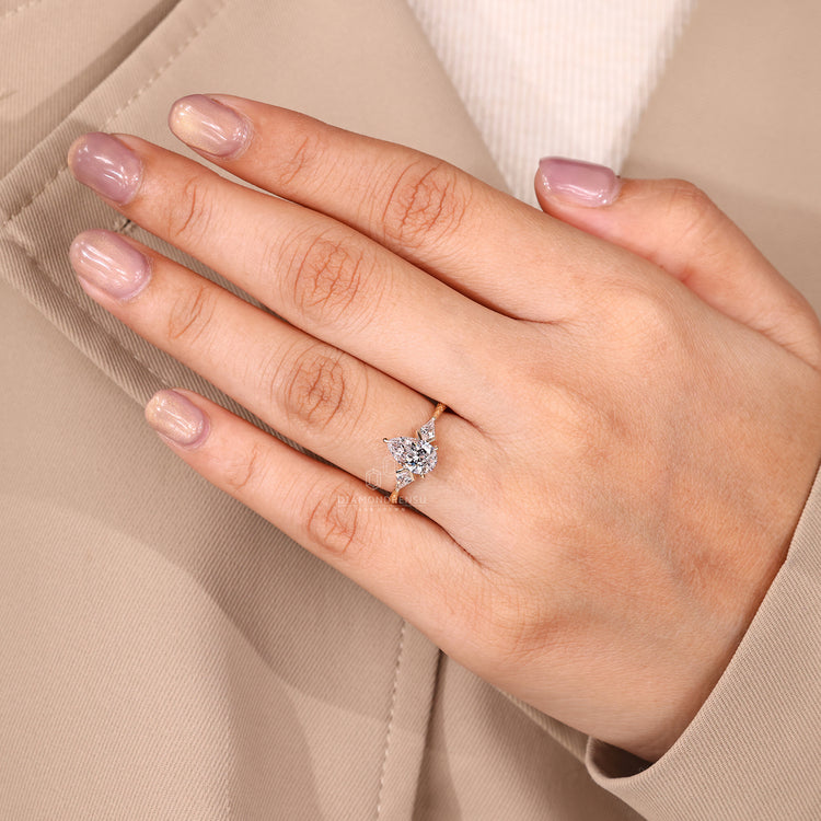 Pear cut diamond ring IGI certified art deco style.