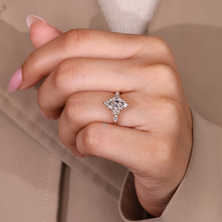 Lab grown marquise diamond ring with tulip basket setting.