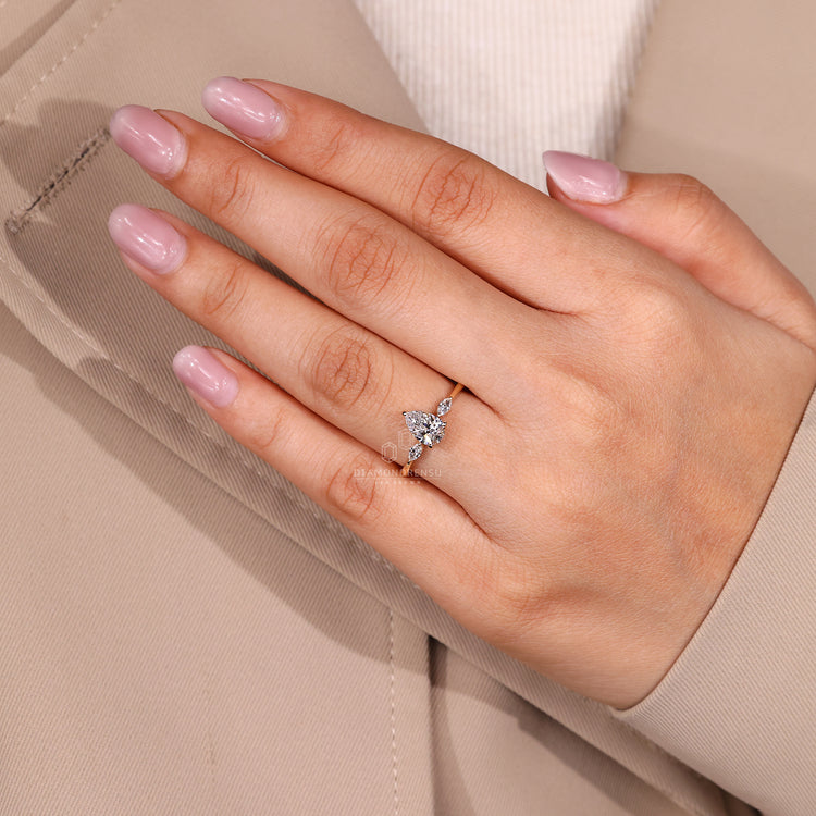 Pear cut diamond ring with three prong setting.
