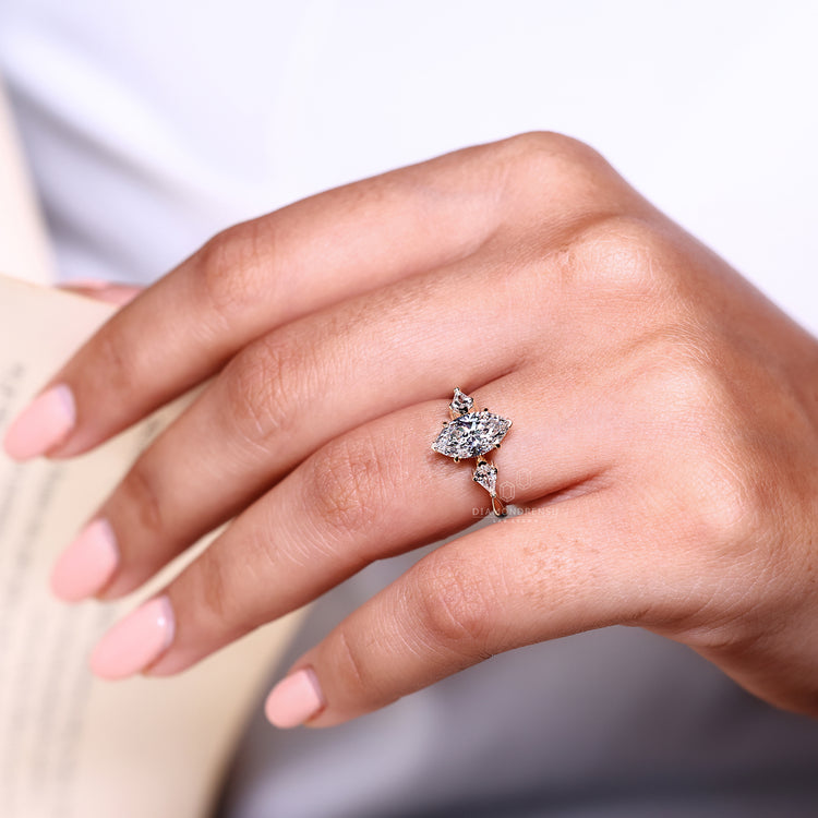 Lab grown marquise diamond three stone ring design.
