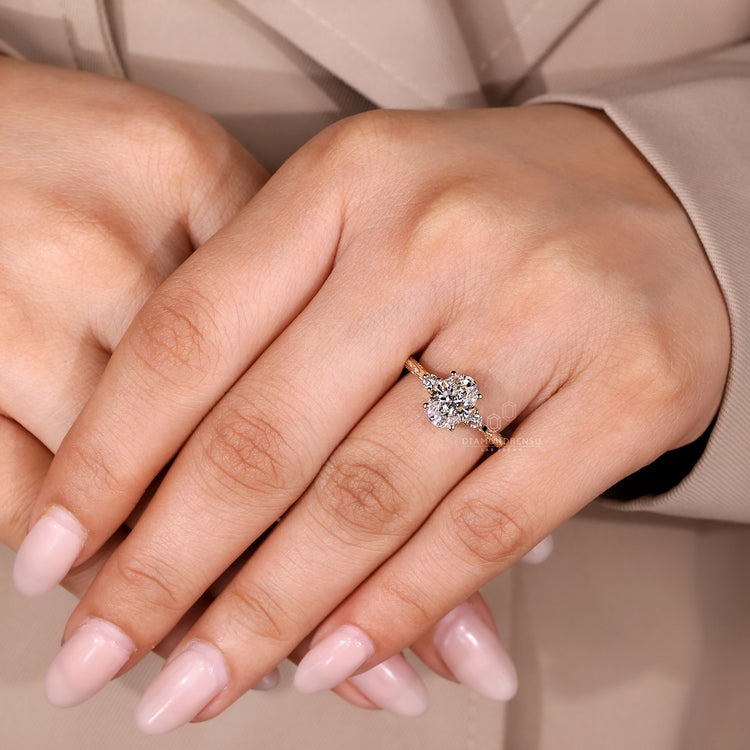 Handmade oval cut diamond ring three stone style.
