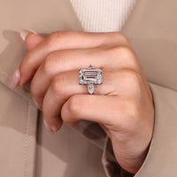 Emerald Cut Diamond Ring with two pear side stones.

