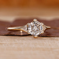 Lab grown hexagon diamond ring triangle side stones.
